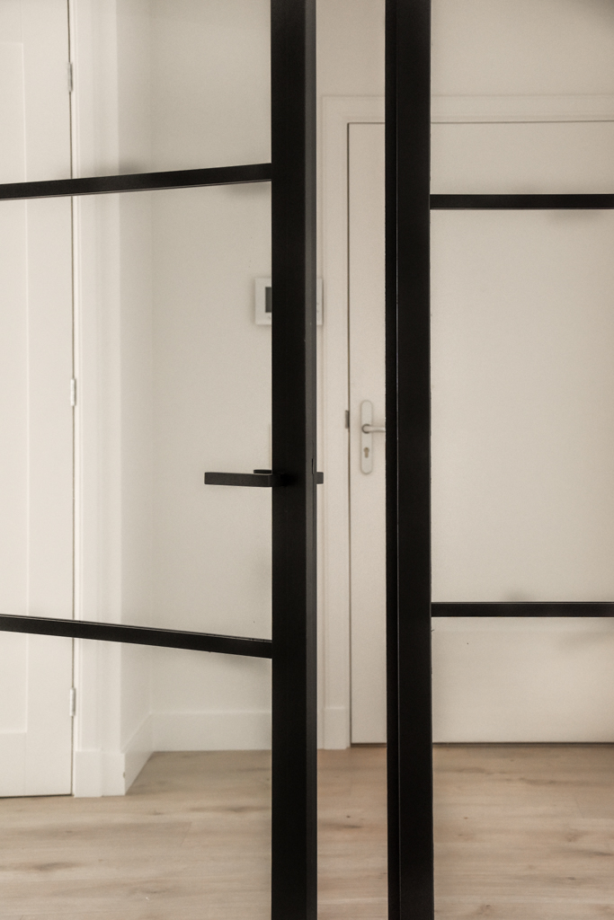High-Gloss Interior Door Spraying in Etobicoke – tall off-white and glass-paneled doors