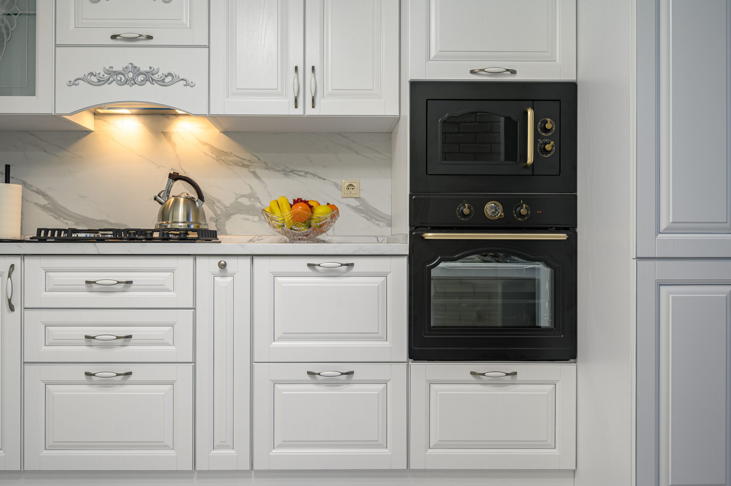 Toronto oak cabinets spray painted white for kitchen renovation alternative