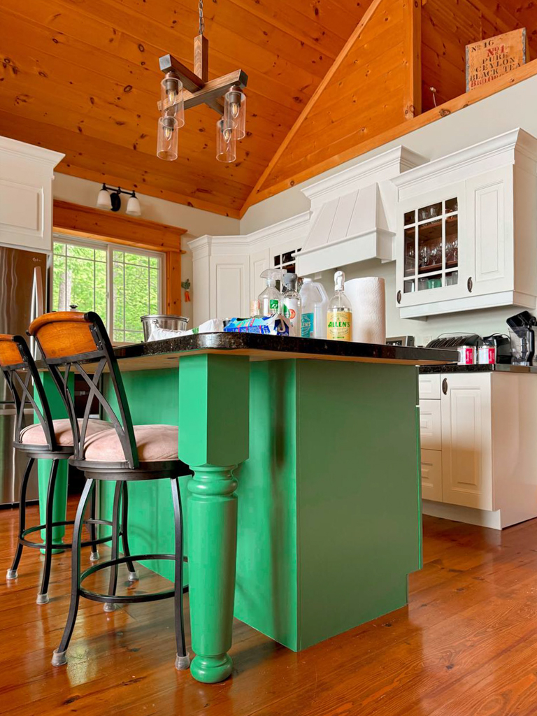 Full cottage kitchen view with newly painted two toned white and green colored cabinets in Keswick, Toronto