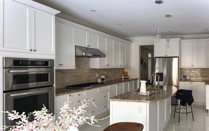 Close-up of a kitchen cabinet door in Markham, Toronto, after professional repainting and refinishing, showcasing a smooth, spray-applied finish.