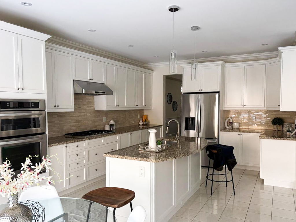 Freshly spray painted white coloured kitchen cabinets in Markham, Toronto