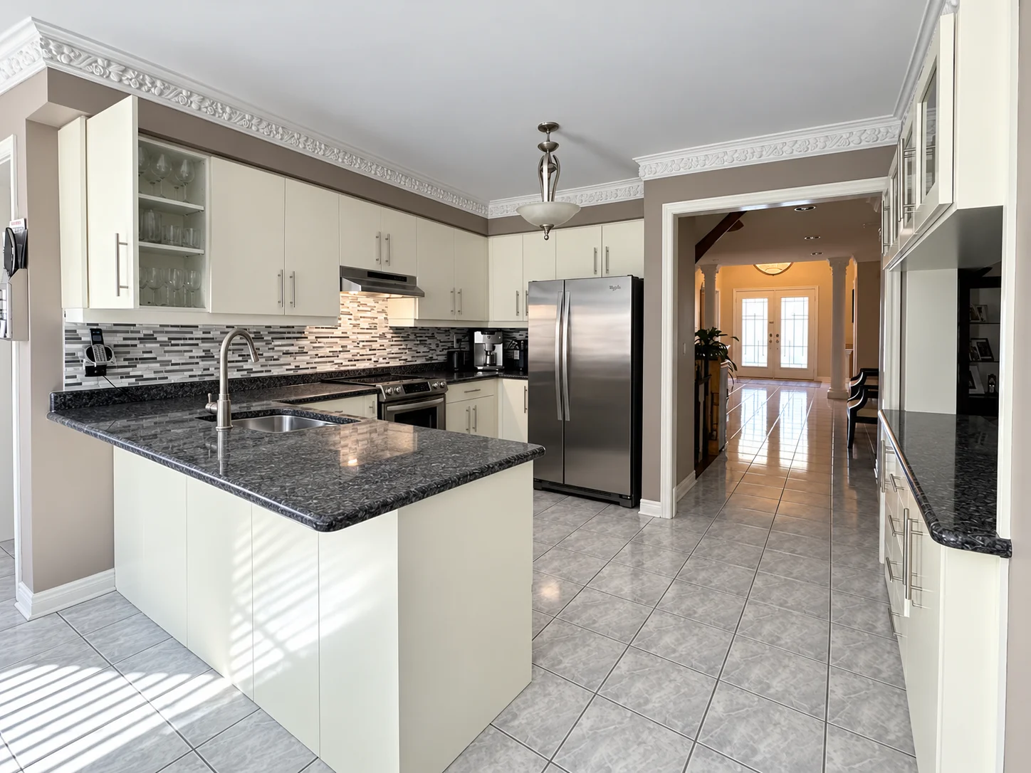 White kitchen cabinets professionally painted in Woodbridge
