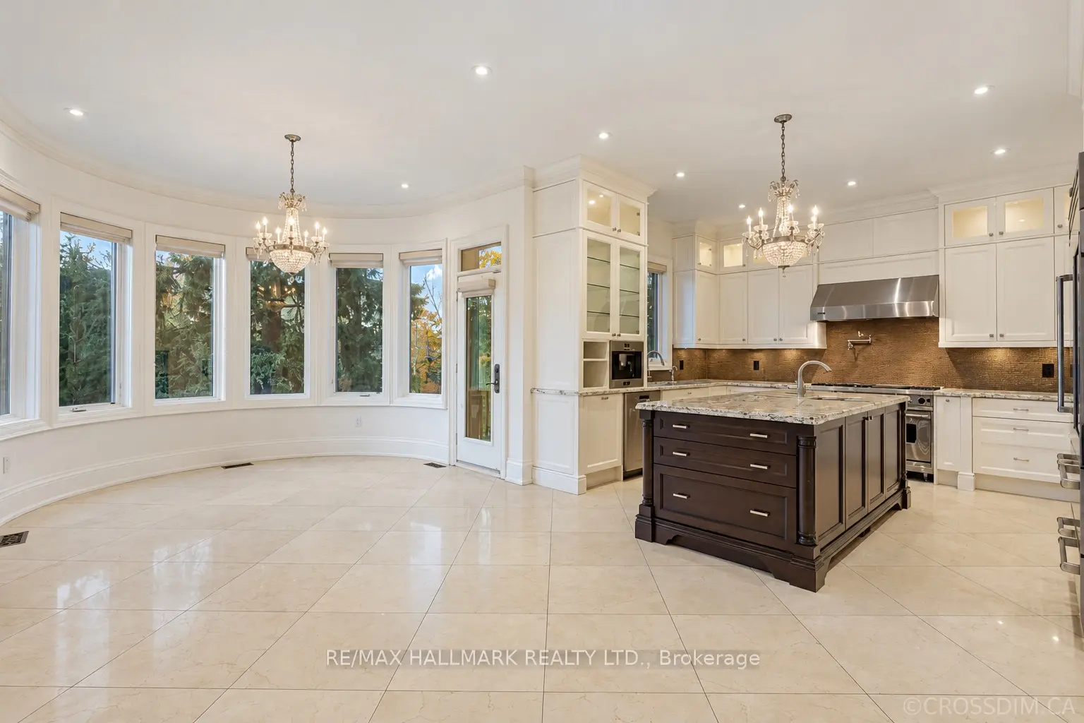 Kitchen cabinet painting cost in Toronto: White Dove kitchen cabinets after repainting in Richmond Hill.